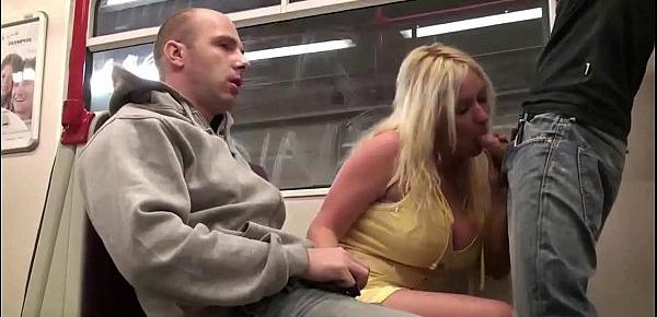  A girl with big tits is fucked by 2 guys in a public subway train